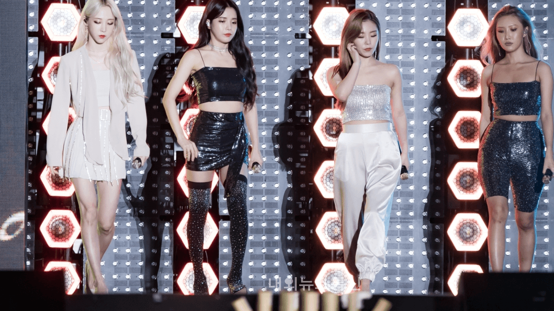 MAMAMOO performing on stage — Solar, Moonbyul, Wheein, and Hwasa