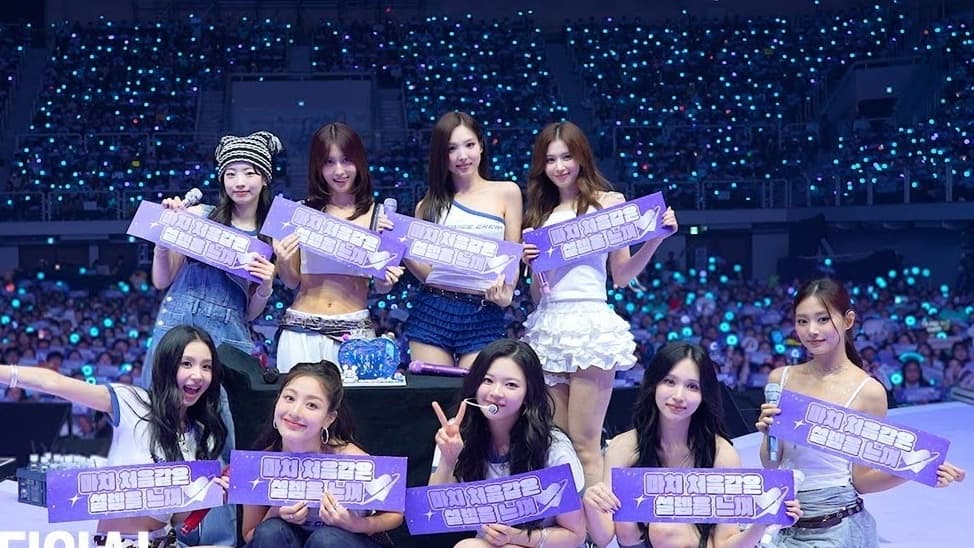 TWICE with fans at a fan event — the group's ONCE fandom has remained one of K-pop's most commercially engaged over a decade