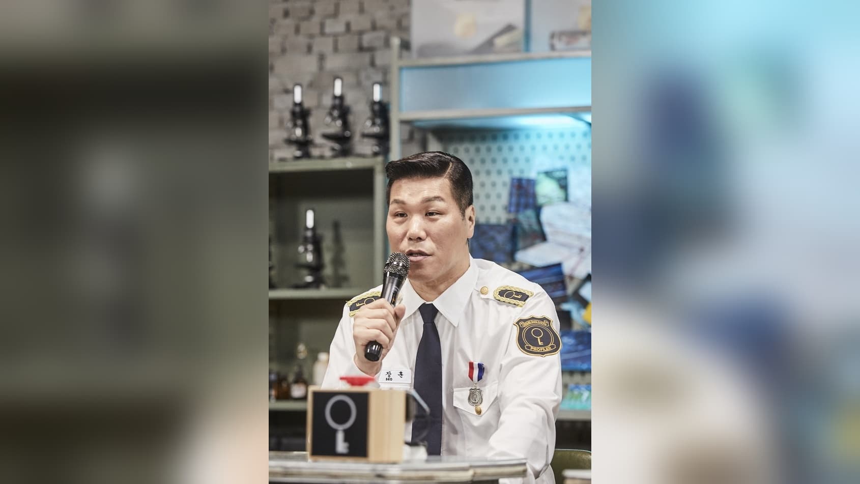 Criminal profiler Kwon Il-yong in his signature uniform during a broadcasting appearance